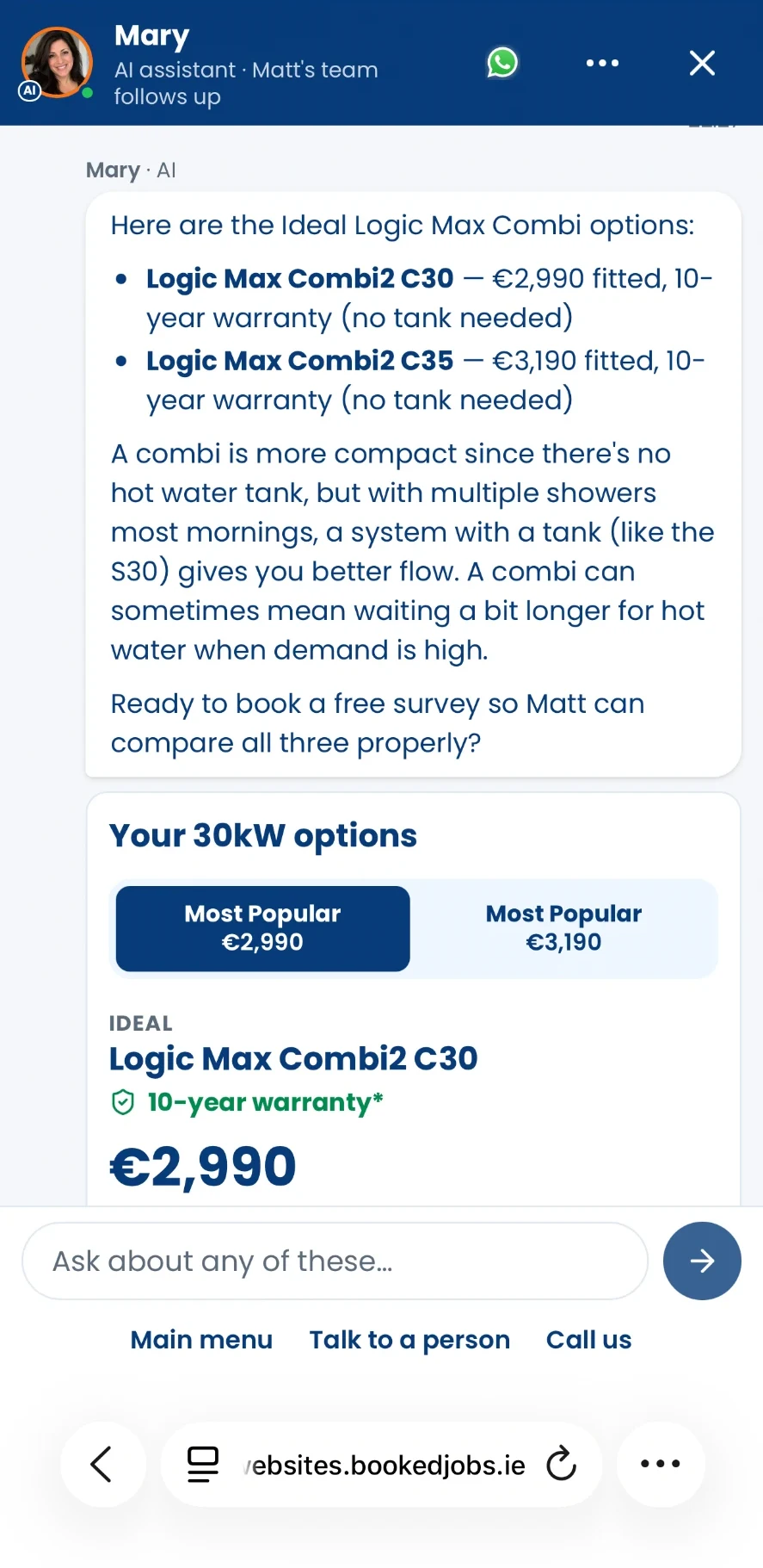 Mary explaining the Ideal Logic Max Combi options above the homeowner's 30kW options card